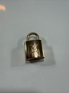 Louis Vuitton Shiny Gold LV Monogram Padlock